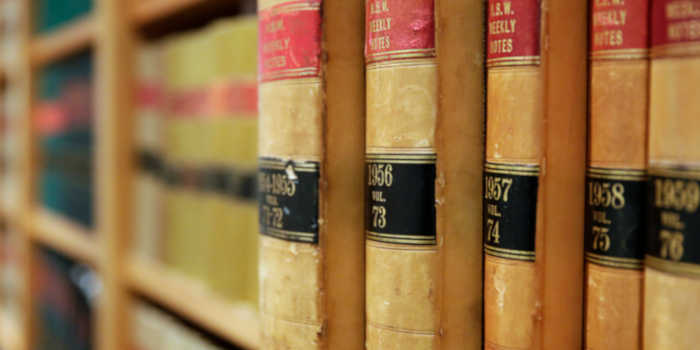 A shelf with legal books.